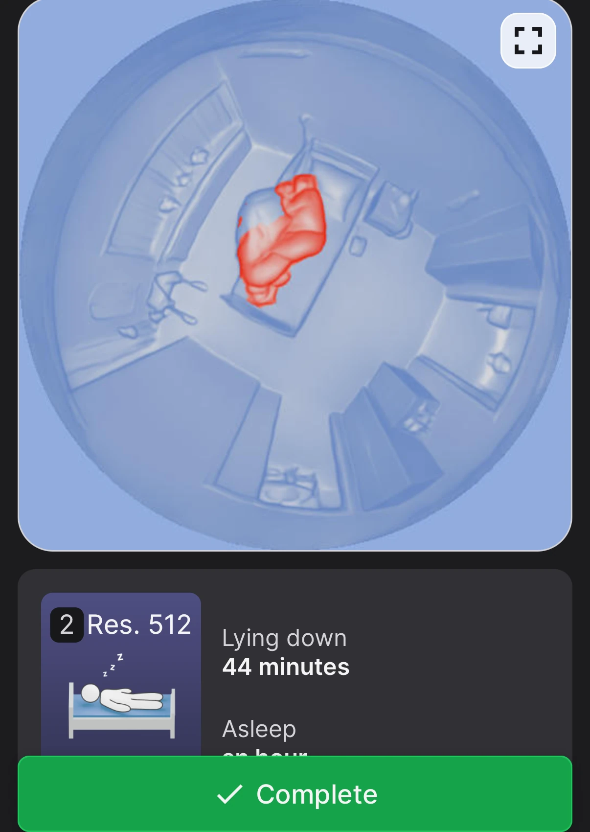 An anonymized snapshot of a resident's room from the ceiling sensor, the resident highlighted in red on a blue rendering of the room.
